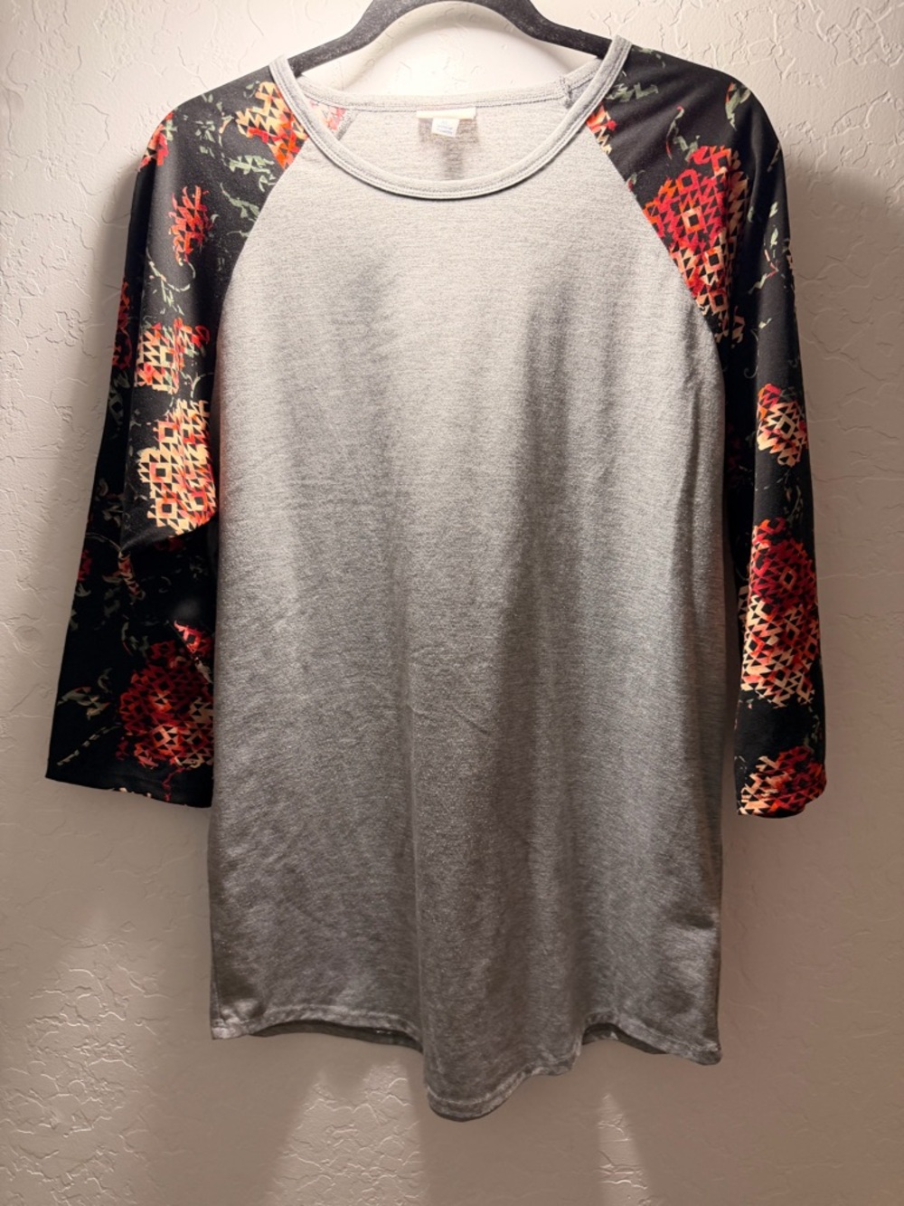 LuLaRoe Gray Tee with Roses with Geometric Pattern Overlay